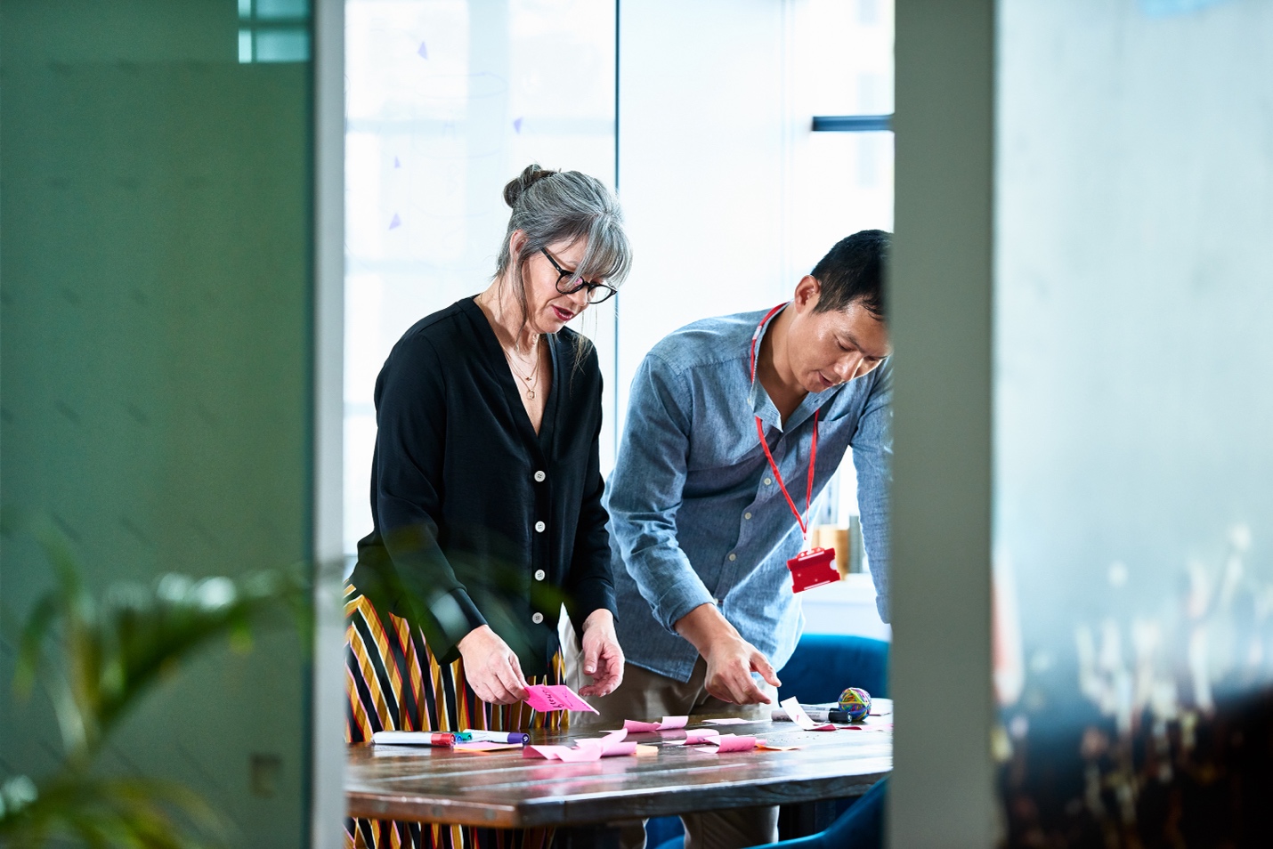 People brainstorming on a table